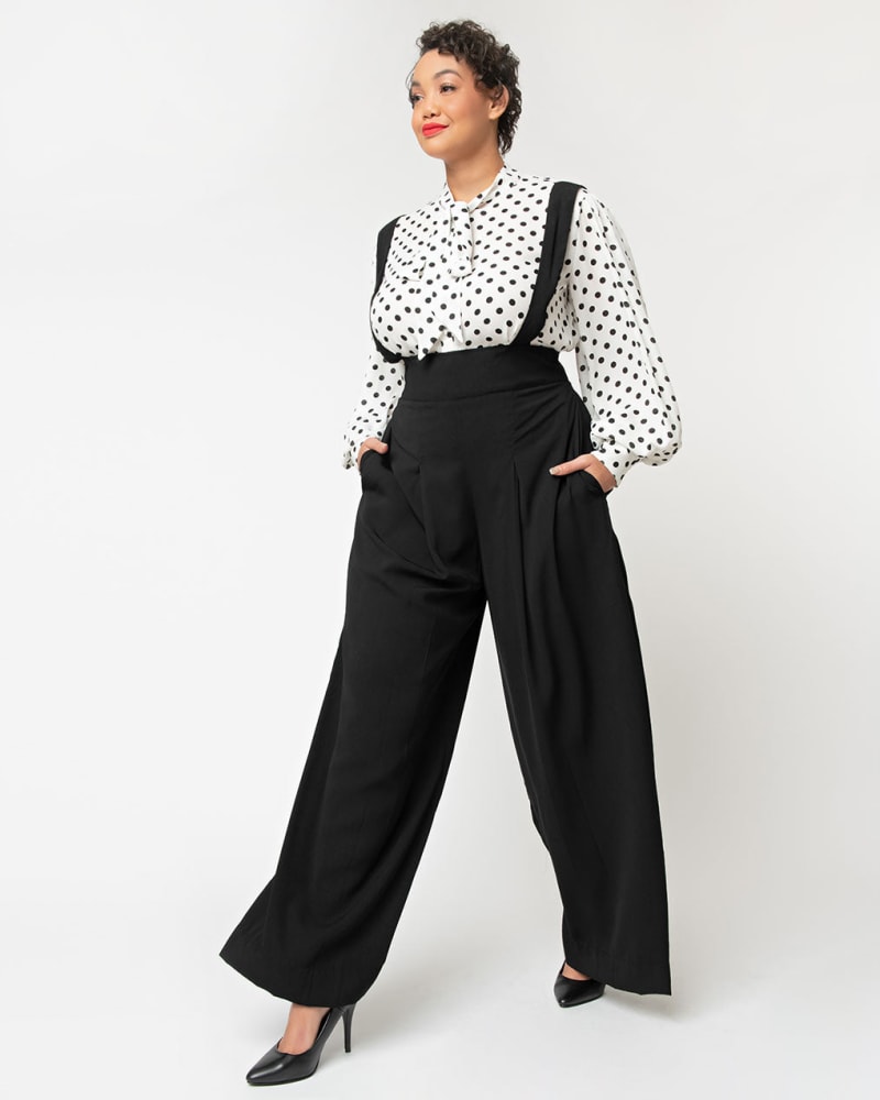 Front of a model wearing a size 5X Unique Vintage Black Wide Leg Rochelle Suspender Pants in Black by Unique Vintage. | dia_product_style_image_id:287175